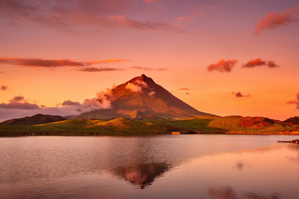 View of Lagoa do Capitão with Mount Pico reflecting in the water. The best place to live in nature and experience tranquility in the Azores