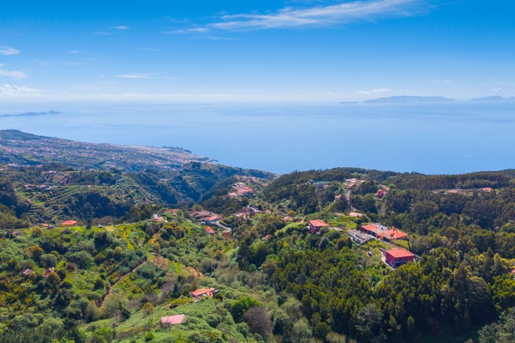 Panoramic aerial view over Santa Cruz coastline and Atlantic Ocean in Madeira near 2,705 m² building plot for sale