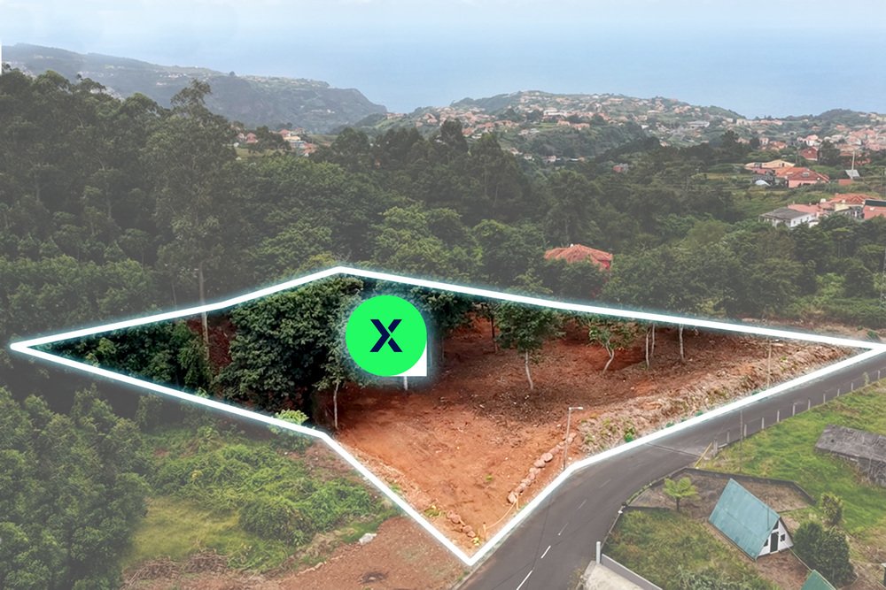 Aerial view of 5090 m2 land plot for sale in Santana Madeira near Pico das Pedras with ocean background
