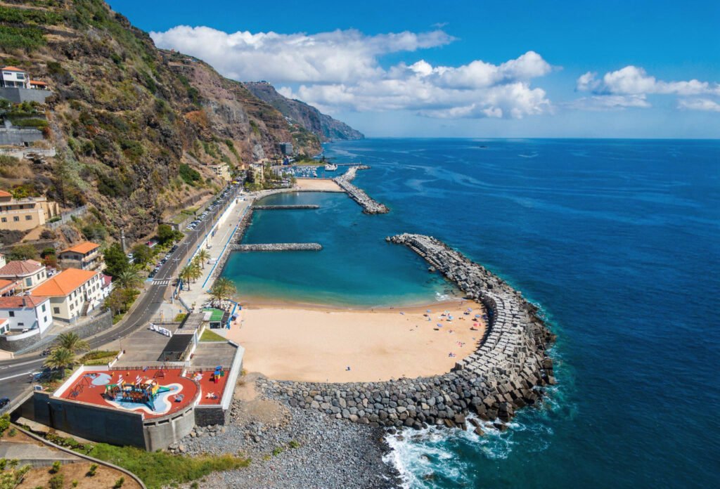 Calheta best place to live golden sand beach and sunny coast in Madeira Island